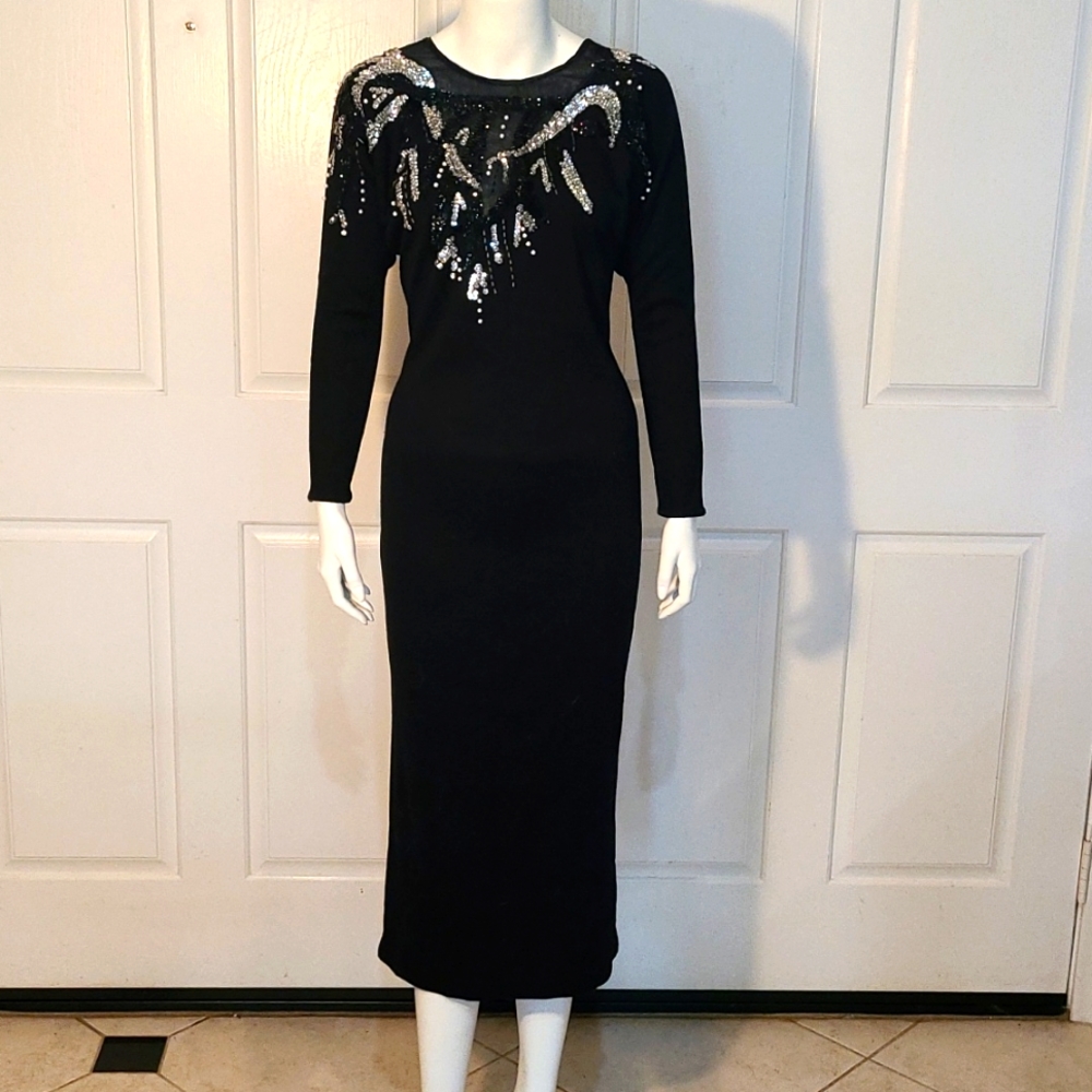 Vintage black form fitting evening dress.